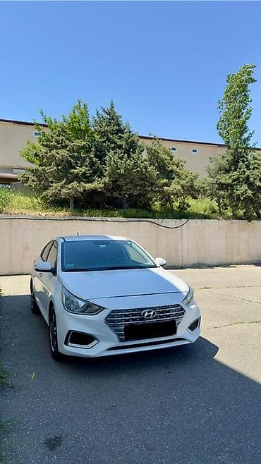 safari n: Hyundai Accent: 1.6 l | 2019 il Sedan — 4