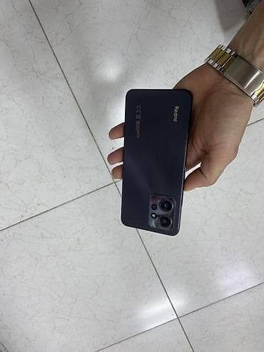 iphone 11 pro islenmis: Redmi smartfon - Korpus: mat tünd-boz rəng, düz kənarlı dizayn, sağ — 4