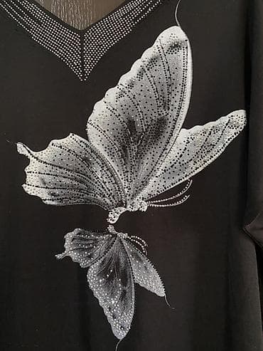 Qadın köynəyi – qara rəng, V-yaxa, qısa qollu. Ölçü 40-L. 42-XL. Tam — 3