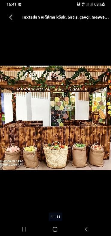 kask satışı: Taxtadan hazırlanmış ticarət köşkü. Bu köşk hər cür ticarət fəaliyyəti — 7