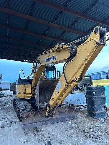 Ekskavator 14 tonluqdur tam işləkdir sadə matordur çox az istifadə