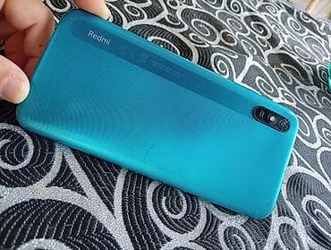Redmi smartfon - Rəng: firuzə/merenji göy arxa qapaq, teksturalı