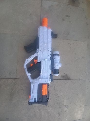 mişka şəkilləri: Oyuncaq blaster tüfəng satılır. Qiymət 30 35 arası dəyişir.Futuristik — 2
