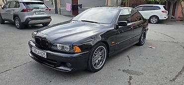 a class mercedes: BMW 5 series: 2.5 l | 1999 il Sedan — 4