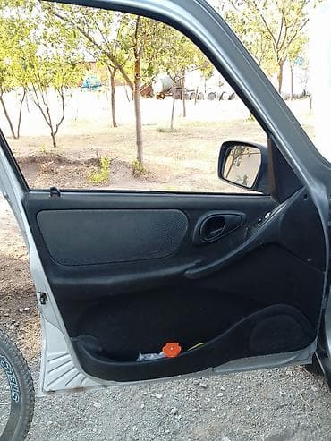 panel ortuyu: Chevrolet Niva: 1.7 l | 2012 il 213000 km Krossover — 9