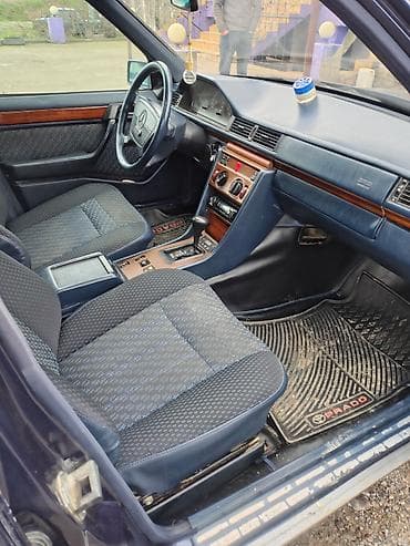 opel astra sükan: Mercedes-Benz W124: 2.2 l | 1995 il Sedan — 4