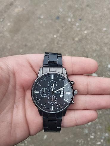 Qara rəngdə klassik kişi qol saatı - Marka: Geneva - Korpus: dairəvi