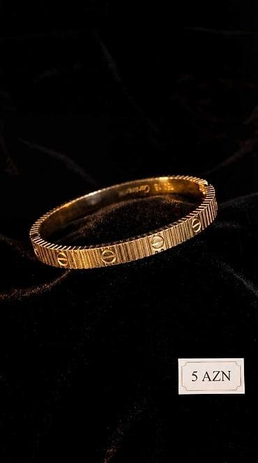 Браслеты: Qızılı rəngdə bərk qolbaq - Material: metal ərintisi, qızılı ton - — 1