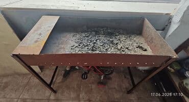 tekerli mangal: Dəmir manqal. İstənilən məkanda rahatlıqla istifadə edilə bilər. Dəmir — 1