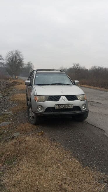 mersedes qapi: Mitsubishi L200: 2.5 l | 2009 il 381810 km Pikap — 8