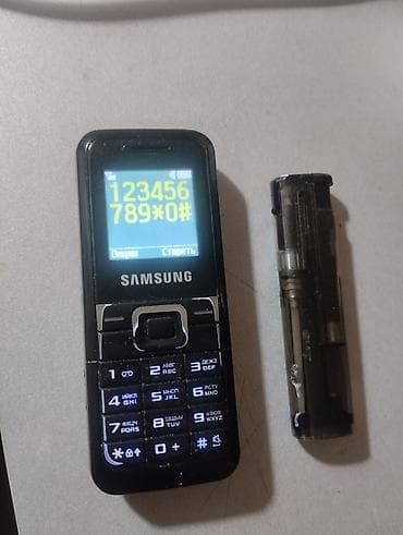 1070: Samsung GT-E1070, rəng - Qara, Düyməli — 2