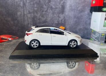 maşın modeli: Коллекционная модель Hyundai i30 5 door white 2012 Pino B&D Scale — 16