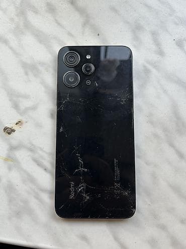 cdma telefonlar: Redmi Not 12 Ram 8,0+4,0 Yaddaş 256 Prablemi arxa şüşəsi qiriqdi — 2