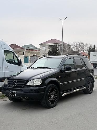 panarama ce kılas: Mercedes-Benz ML 320: 3.2 l | 2000 il Ofrouder/SUV — 7