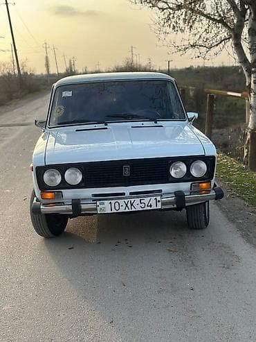 VAZ 2106, ağ rəng, klassik sedan Xüsusiyyətlər: - Kuzov: 4 qapılı