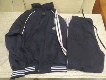 L razmerdir .Uşaq üçündür.Adidas markalı qara rəngli idman kostyumu
