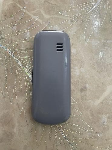 knopka: Raeno R1280 düyməli mobil telefon Xüsusiyyətlər: - Kompakt korpus — 5