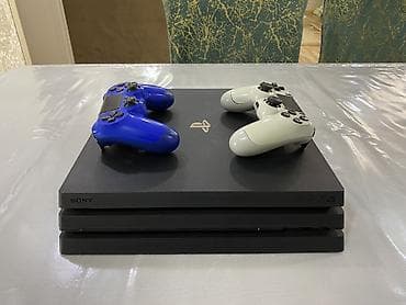 android tv boxlar: Ps4 PRO Proşifka 9.00 plombu üzərində 1Tb arginal 2 pult İçi dolu — 1