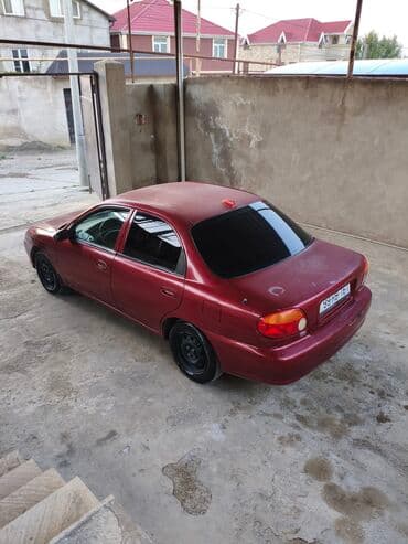 kia forte 2017: Kia Sephia: 1.6 l | 1998 il Sedan — 4