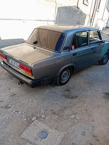 ot bicen traktor satisi: Model: Lada 2107 sedan Rəng: Tünd boz/göy tonları Kuzov: 4 qapı — 6