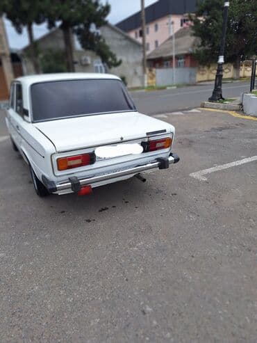 ваза стеклянная прозрачная высокая без узора: VAZ 2106 sedan - Korpus: Ağ rəng, 4 qapı, xrom ön-arka bamperlər — 19