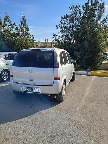 elektrikli muravey: Opel Astra: 1.6 l | Hetçbek — 2