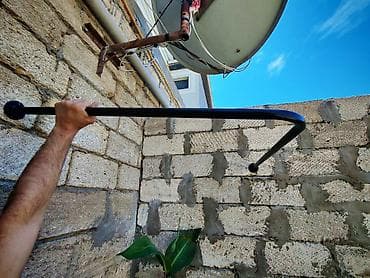 Metal borular: Metaldan L‑şəkilli divara bərkidilən dirək/çəpər konstruksiyası - — 3