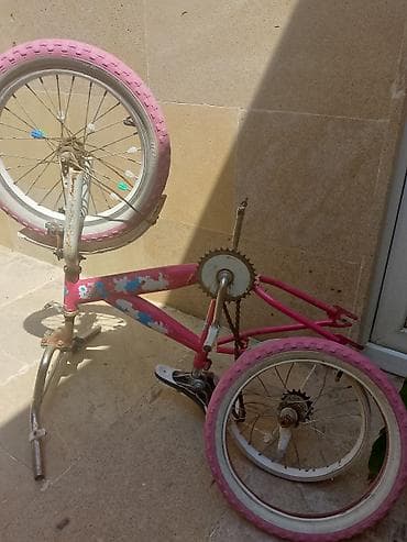 Uşaq velosipedi – 16" təkər ölçüsü, çəhrayı rəng.arxa diskində problem — 1