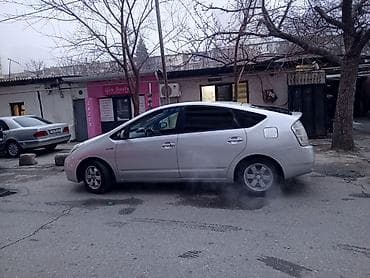 opel vectra a: Toyota Prius, gümüşü rəng, 5 qapılı liftbek. Hibrid benzin-elektrik — 3