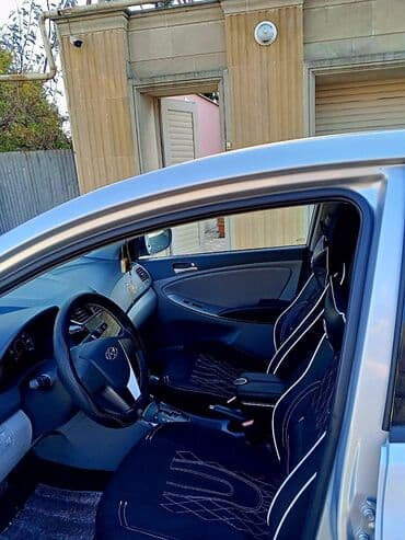 kia sportage 2006: Hyundai Accent: 1.4 l | 2016 il Sedan — 6