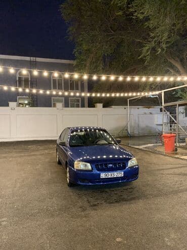 Hyundai Accent: 1.6 l | 2001 il Sedan — 8