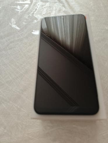 telefonlar ikinci el: Xiaomi 32 GB, rəng - Qara, 
 Barmaq izi, İki sim kartlı — 6