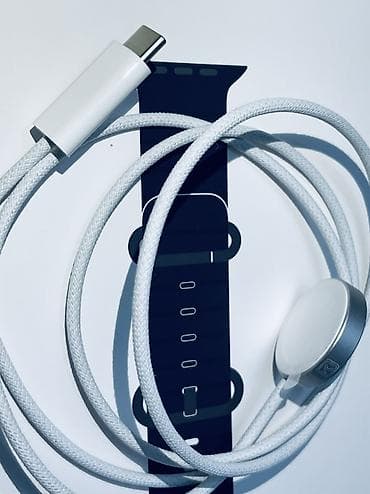 apple watch ultra 1: Apple Watch Ultra 3 modeinin qutusundan çıxma maqnitli sürətli şarj — 3