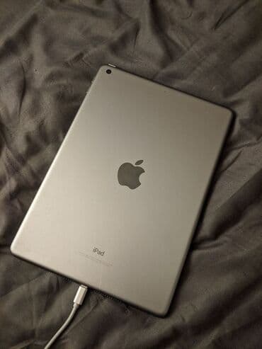 Apple iPad (Space Gray) Xüsusiyyətlər: - 9.7" Retina ekran - Touch ID