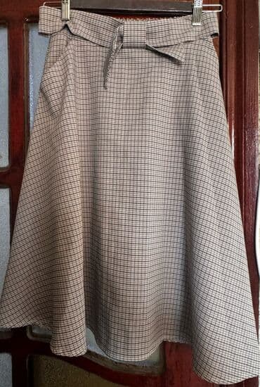 şiş qadın ətəkləri: - Qadın ətəyi: A-kəsim, dizə yaxın uzunluq. Xırda xanalı (çəkmə) — 2