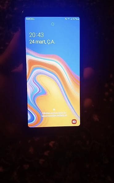 plasteşin 3: Samsung Galaxy J4 Plus, 16 GB, rəng - Qızılı, Düyməli, Barmaq izi, İki sim kartlı — 1