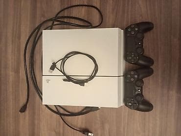 PS3 (Sony PlayStation 3): Məhsul: Sony PlayStation 4 (ağ rəng) Təsvir: - PlayStation 4 konsolu — 1