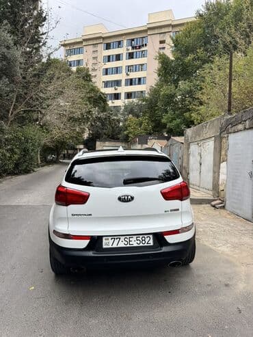 Yağlar və avtokimyəvi maddələr: Kia Sportage SX GDI – ağ rəngli, şəhər və uzun yol üçün komfortlu — 2