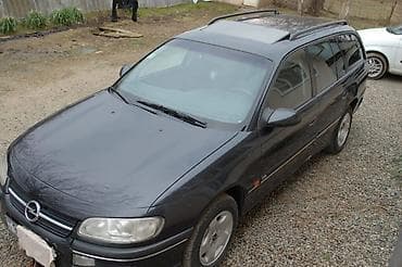 vaz lada 2104: Opel Omega: 3 l | 1995 il 27500 km Universal — 4