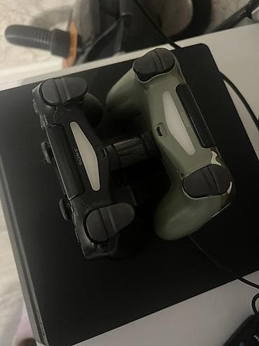 PlayStation 4 (PS4) oyun konsolu (1TB) və 2 ədəd orijinal DualShock 4 — 2