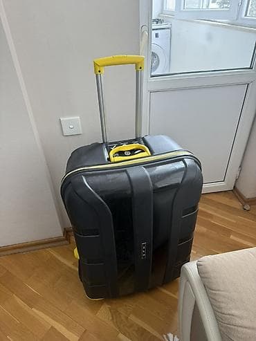 4 teker velosiped: Sərt korpuslu təkərli səyahət çantası (çamadan) 23 kg liqdir. Yaxşı — 1