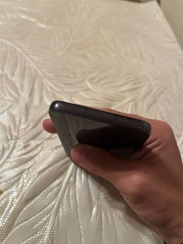 es 23 telefon: Samsung Galaxy S23, rəng - Qara, Barmaq izi — 4