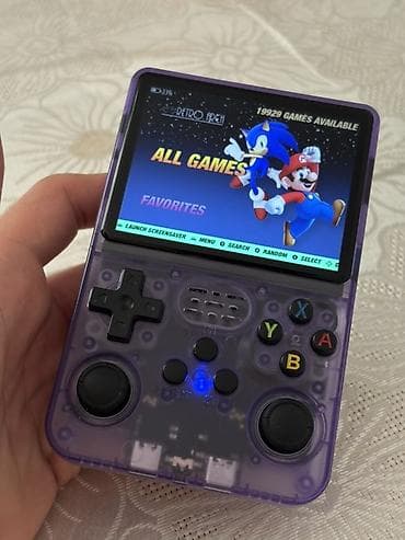 playstation ekranı: R36S portativ retro oyun konsolu – bənövşəyi şəffaf korpuslu, 3.5" — 3