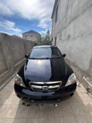 tek oturacaqlar: Kia Sorento: 2.5 l | 2008 il Krossover — 1