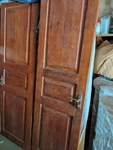 Alçipan: Məhsul: Taxta qapılar (2 ədəd) Təsvir: - Klassik dizaynlı, panelli — 1