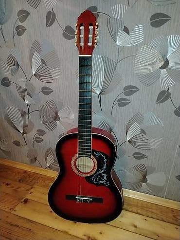 gitara tornado: Gitara Xüsusiyyətlər: - Korpus: tam ölçülü dreadnought forması, laklı — 1