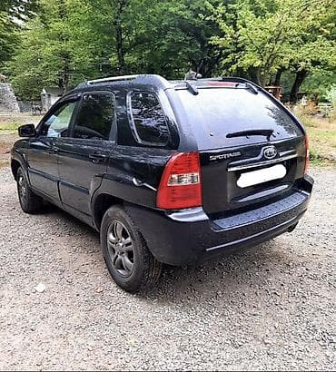 kia caren 2012: Kia Sportage – qara rəngli, kompakt SUV 15.500 2008ci il Texniki — 2