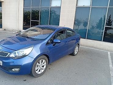 tesla model 3: Kia Rio: 1.4 l | 2013 il Sedan — 3