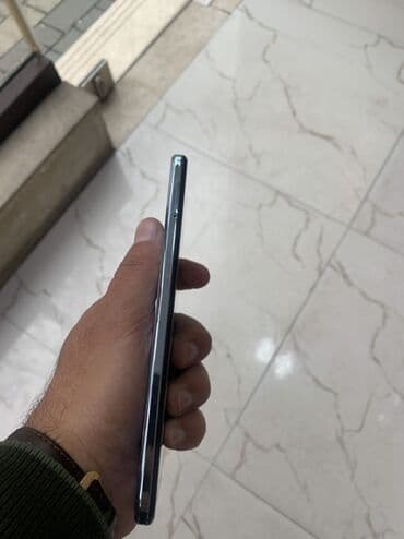 ucuz plansetler qiymeti: TCL T676Hsmartfon - Rəng: açıq mavi arxa panel, mat tekstura, metal — 3