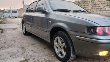 vaz 21011 ucuz qiymete: Samand sedan – benzinli, ön ötürücülü. Gümüşü rəng.nömrə nişanı — 8